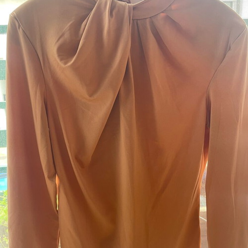 Calliope bodysuit pink like new, elastic with shoulder pads