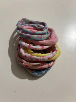 Hair ties, clips and barrettes multicolored, unused