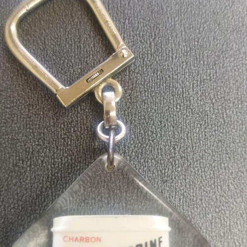 Vintage keychain like new with metal Quinocarbine pharmaceutical box