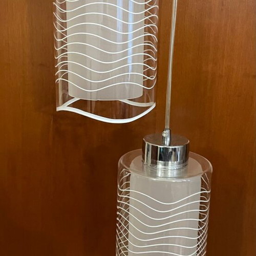 Pendant lamp with two glass shades used, adjustable height