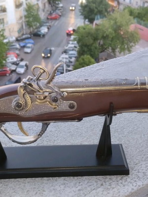 Pistol lighter used, with stand and decorative