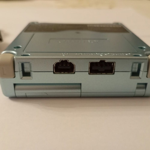 Gameboy Advance SP console with Inukko Club game and USB charger
