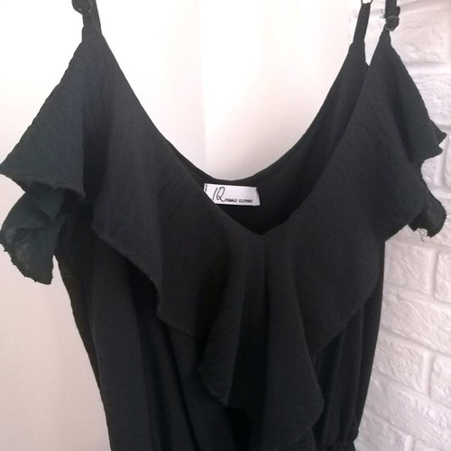 One-piece jumpsuit with ruffles like new, black, size M