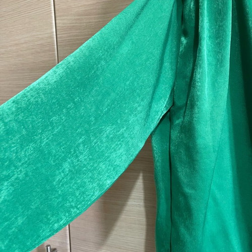 Green blouse size M like new with gathers and draped neckline