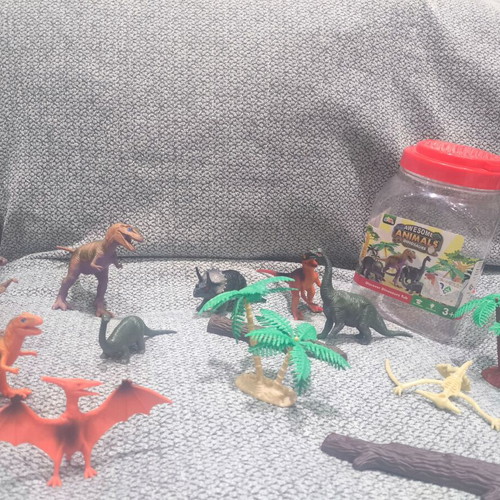 Dinosaur figure set like new, 9 figures with trees and sticks