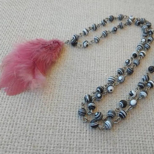Long necklace with feather and semi-precious stones made to order