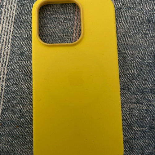 iPhone 14 Pro genuine case used with minor wear and blue case included