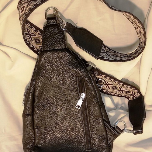 Black Sling Bag Crossbody backpack like new with wide strap and multiple pockets