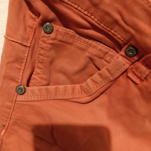 Please Italian orange jeans size M used