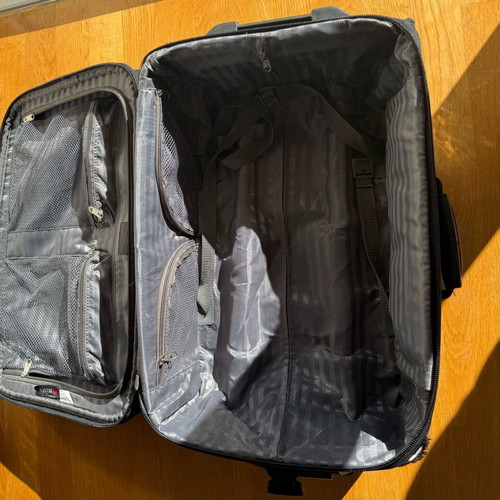 Delsey suitcase used with wheels small size black