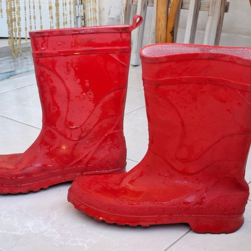 Red rain boots used, size 39