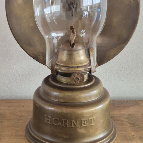 Hornet brass oil lamp with large reflector, antique English
