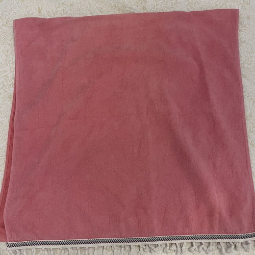 Beach towel used, coral color