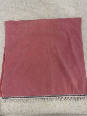 Beach towel used, coral color