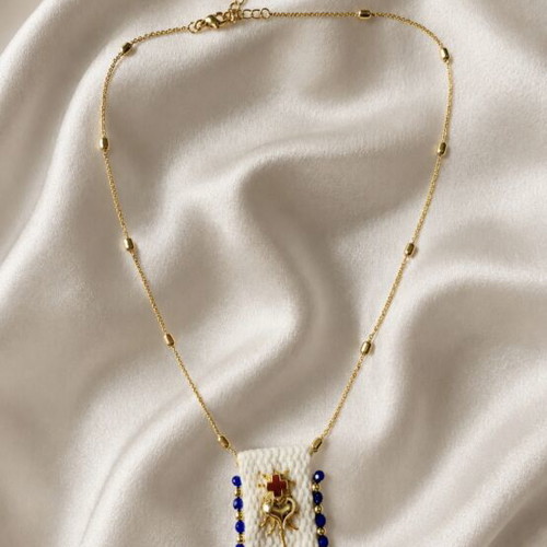 Steel necklace new, gold tone with blue beads and handmade motif