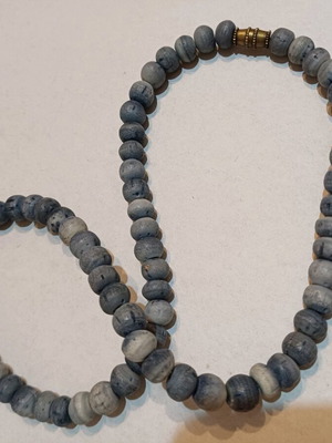 Necklace used with porous blue-gray stones from Thailand