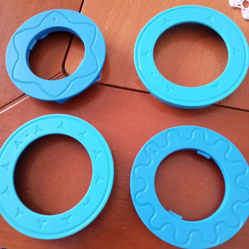 Tupperware cookie cutters like new, set of 3 with tree, boot and little person designs