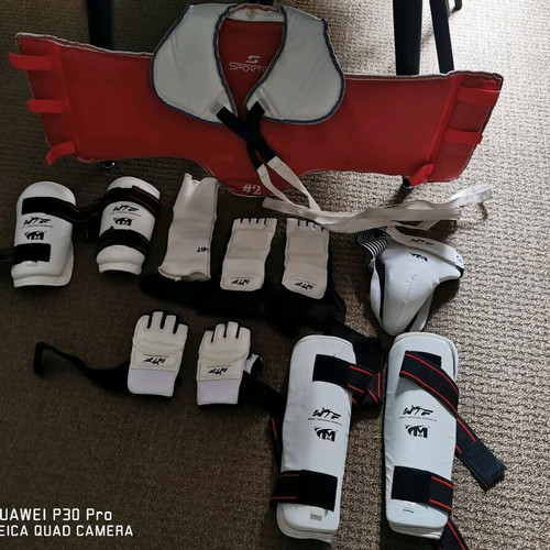 Tae Kwon do equipment used with medium chest protector and small accessories