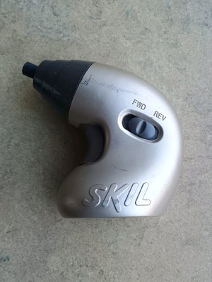 Skil cordless screwdriver used with original charger