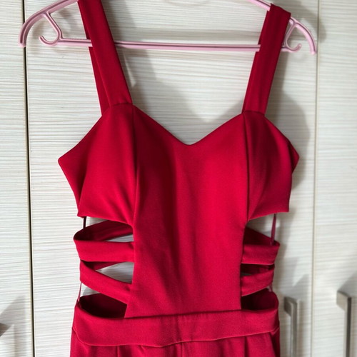 Red one-piece jumpsuit like new with side cutouts and bust support