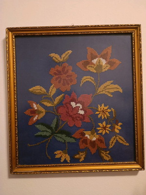 Vintage handmade cross-stitch frame used