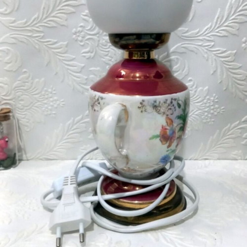 Electric ceramic vintage lamp used with floral decoration
