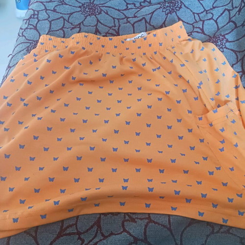 Mini skirt used orange with blue butterflies for girls 14-15 years