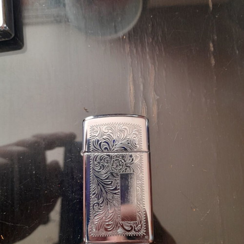 Zippo Venetian Slim Lighter like new, silver floral design