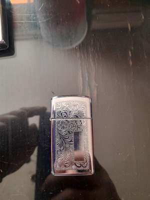 Zippo Venetian Slim Lighter like new, silver floral design