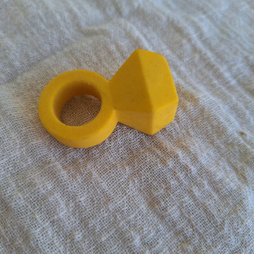 Yellow eraser in ring shape like new