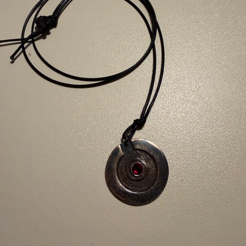 Handmade pendant like new with dark red stone and leather cord