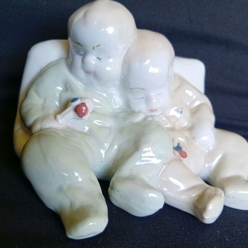 Porcelain figurine of twin babies like new