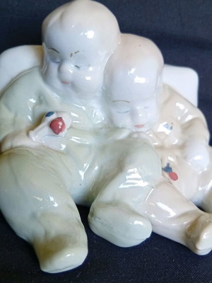 Porcelain figurine of twin babies like new