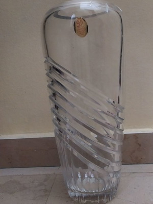 Decorative crystal vase used with small chip on rim