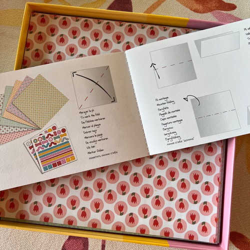 Djeco Origami paper sets used, colorful sheets for crafts