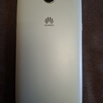 Huawei mobile phone used, white, with headphones and charger