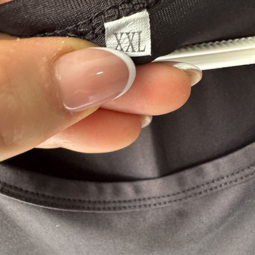 Blouse with X on shoulders like new, black, XXL