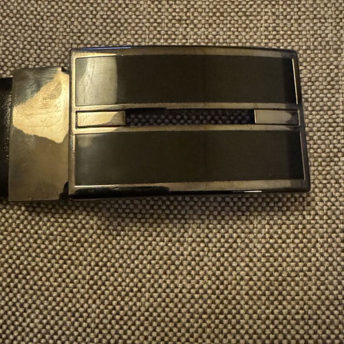 Belt buckle like new, black and silver