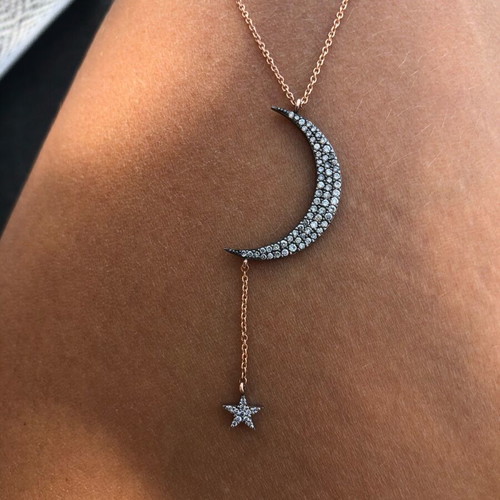 Moon and star necklace like new, pink gold with diamonds