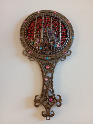 Antique hand mirror with many details, new