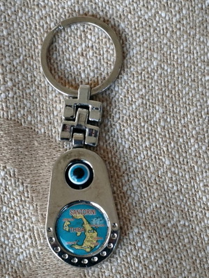 Santorini keychain like new, metal with evil eye and map