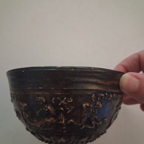 Replica vessel with embossed erotic scenes from Pella Museum, used