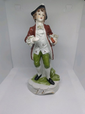 Male porcelain figure like new with lace detail