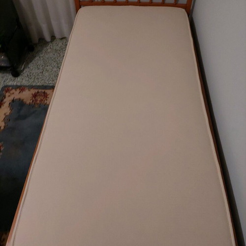 Single solid wood bed used with new mattress