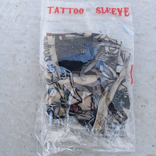 Fake tattoo sleeve from magazine like new