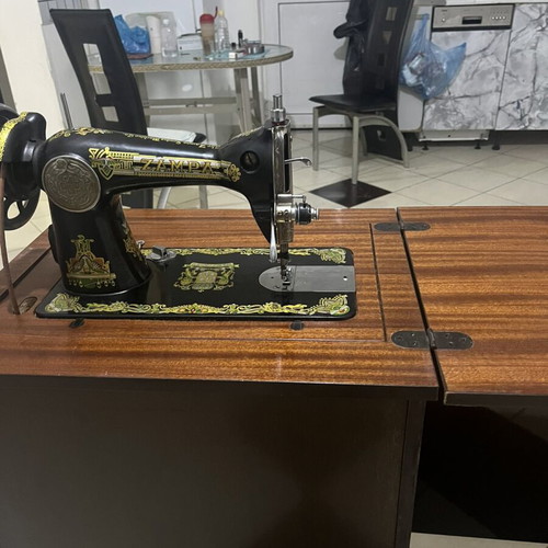 ZAMPA vintage sewing machine with wooden cabinet used