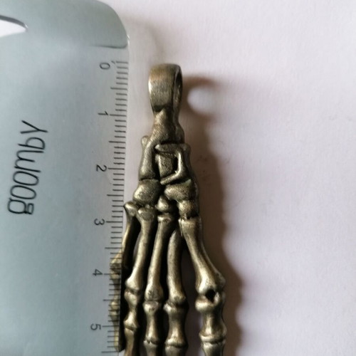 Metal skeleton foot pendant Young Zone new with tribal designs