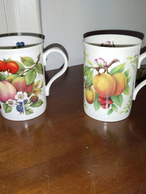 Porcelain mugs set of 7 with different designs new