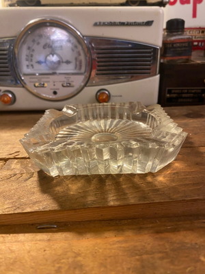 Glass ashtray used with unique shape