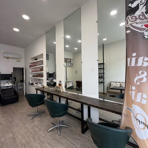 Hair salon equipment used with Electra sofa, table, mirrors, sinks, shelves